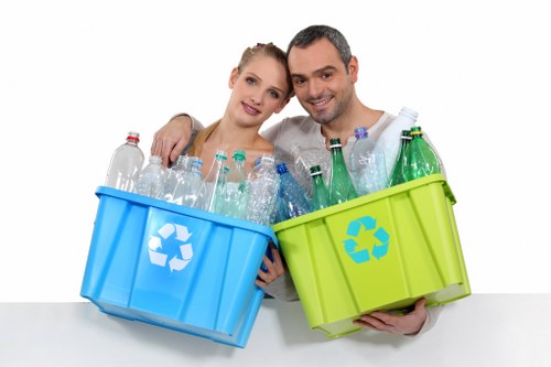 Commercial recycling bins and workers in Beckenham street scene